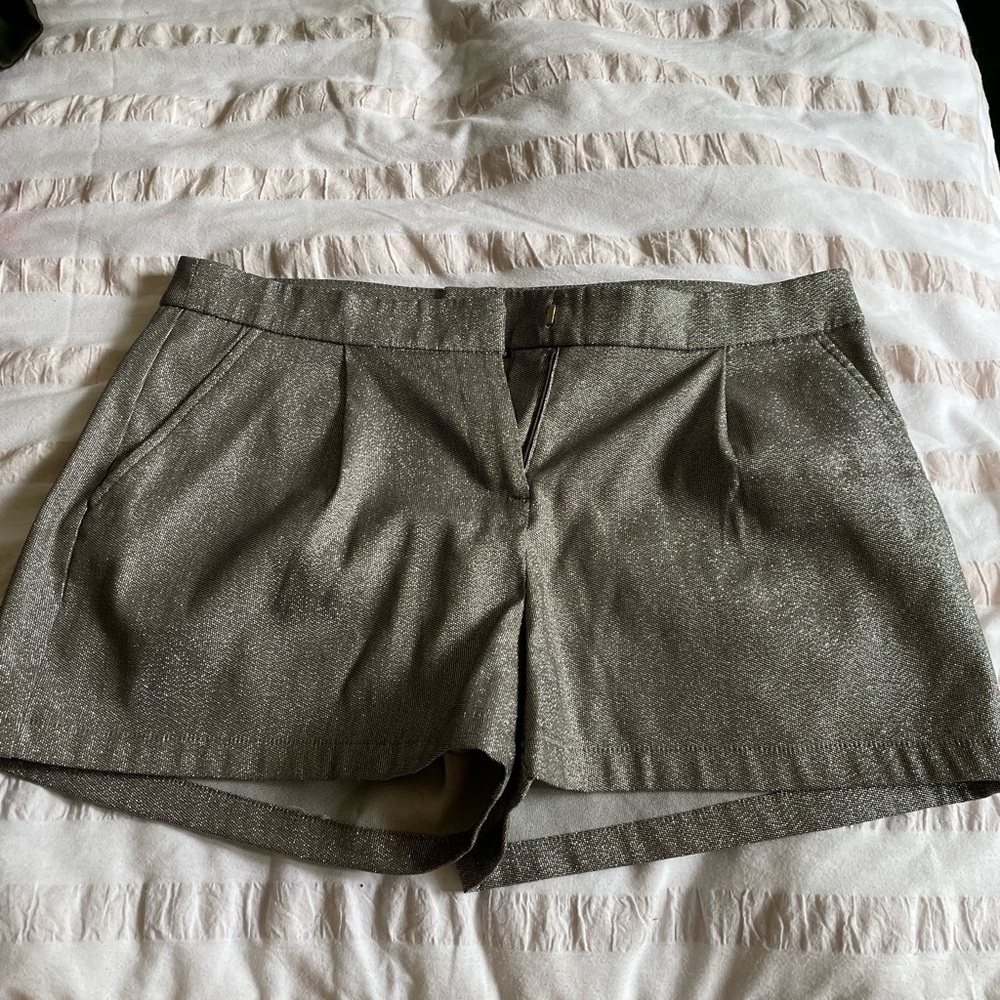 Jlo shiny shorts, pockets in front and back!